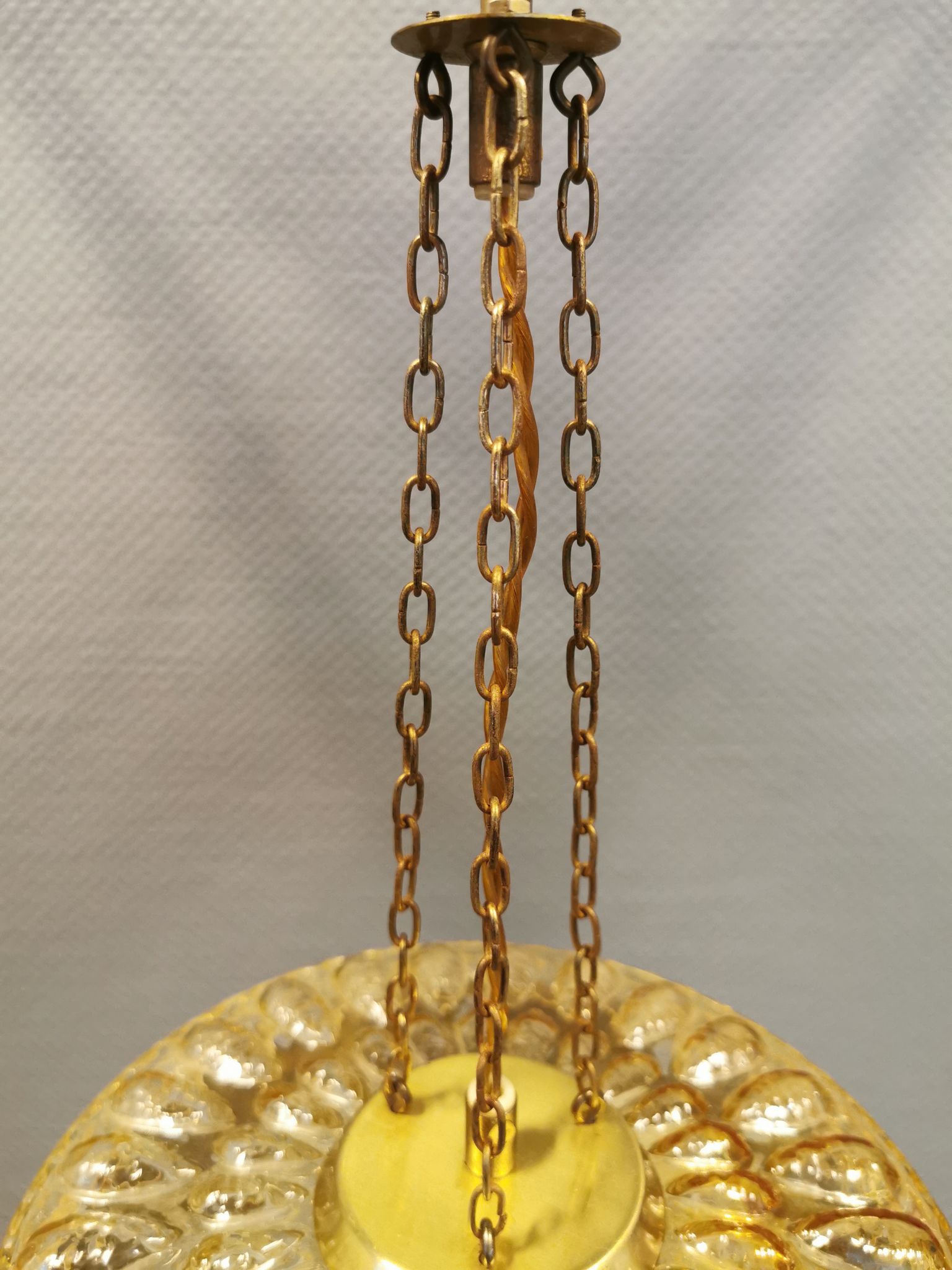 Ceiling-hanging lamp in glass with prisms and metal details