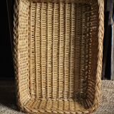 A large vintage rectangular wicker basket