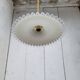 Serrated opaline suspension
