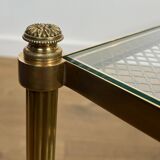 Rare bronze, brass, and steel mesh coffee table with a double glass top resting on a brass mesh. French work by Jansen