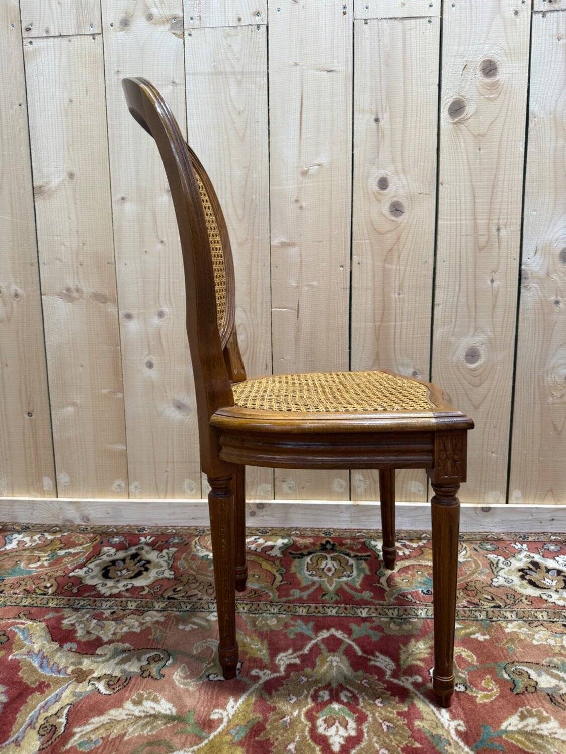 Set of 6 Louis XVI medallion chairs with caning.
