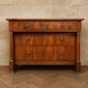 Commode d'époque Empire en noyer à colonnes détachées et bronzes dorés