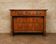 Empire period walnut commode – Detached columns – Gilded bronzes