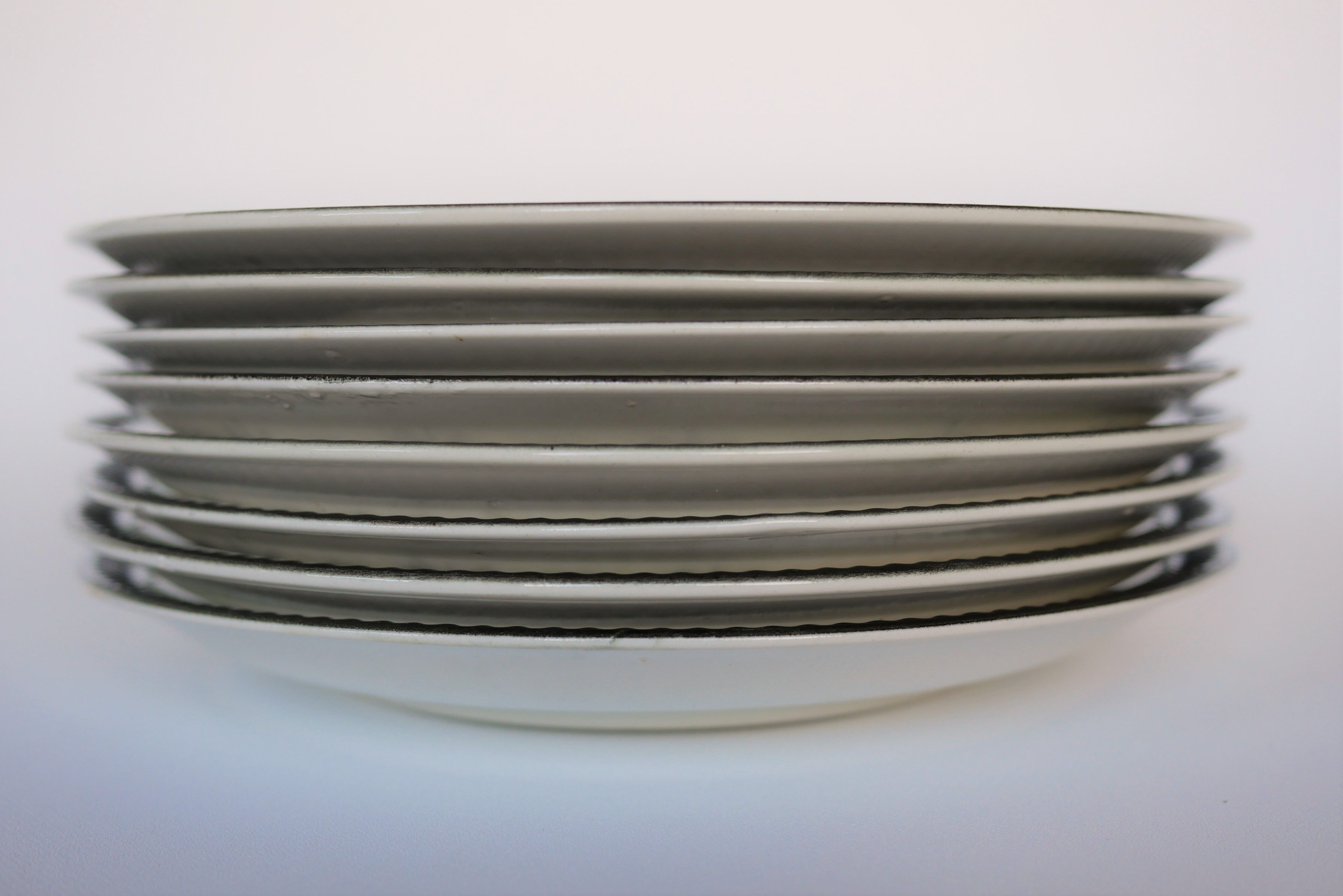 Series of 8 vintage plates edited by Boch La Louvière