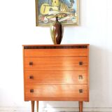 Mid-century brown teak chest of drawers with three drawers, tapered legs from the 1960s.