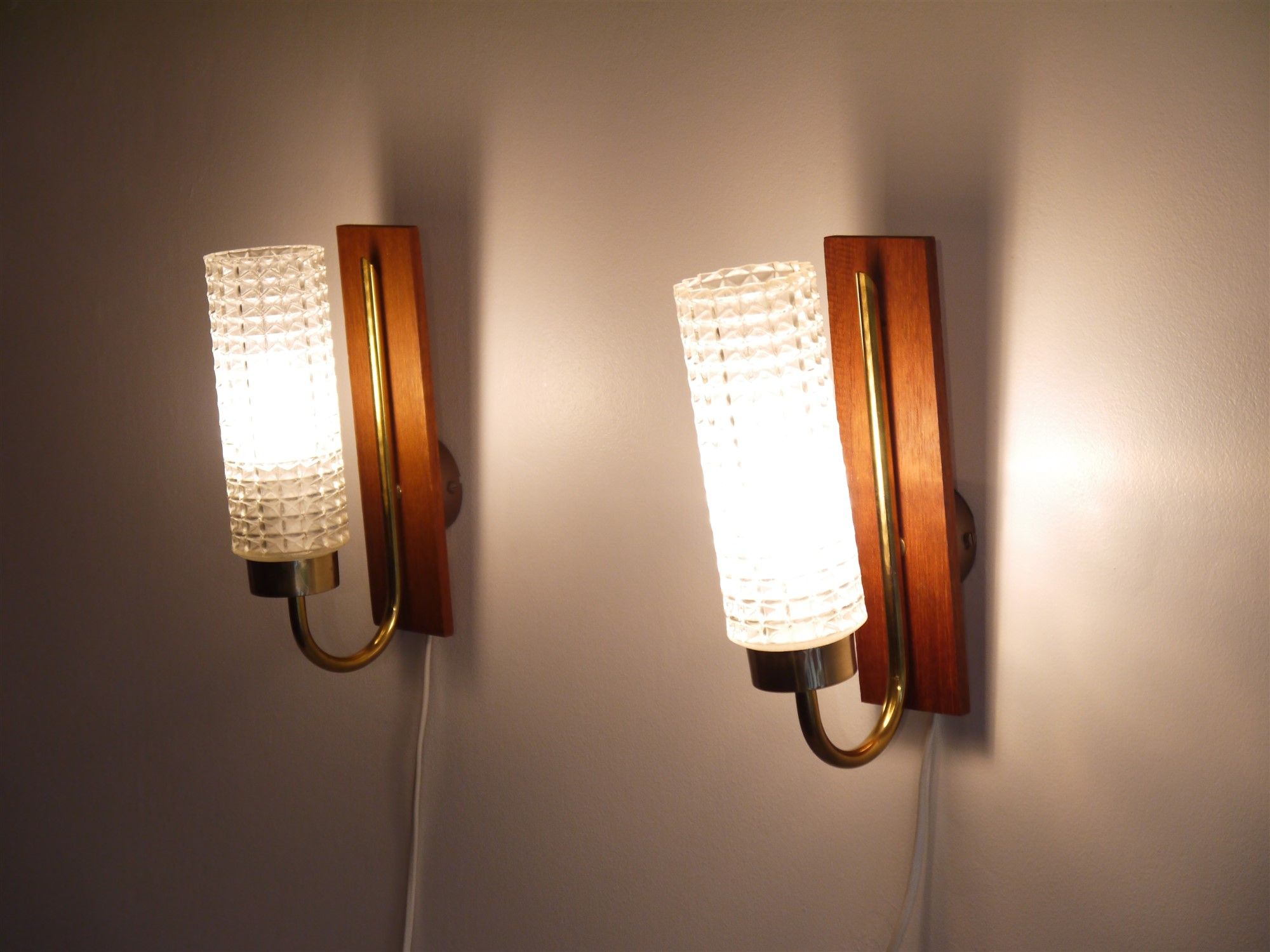 Pair of Scandinavian vintage teak and glass appliques