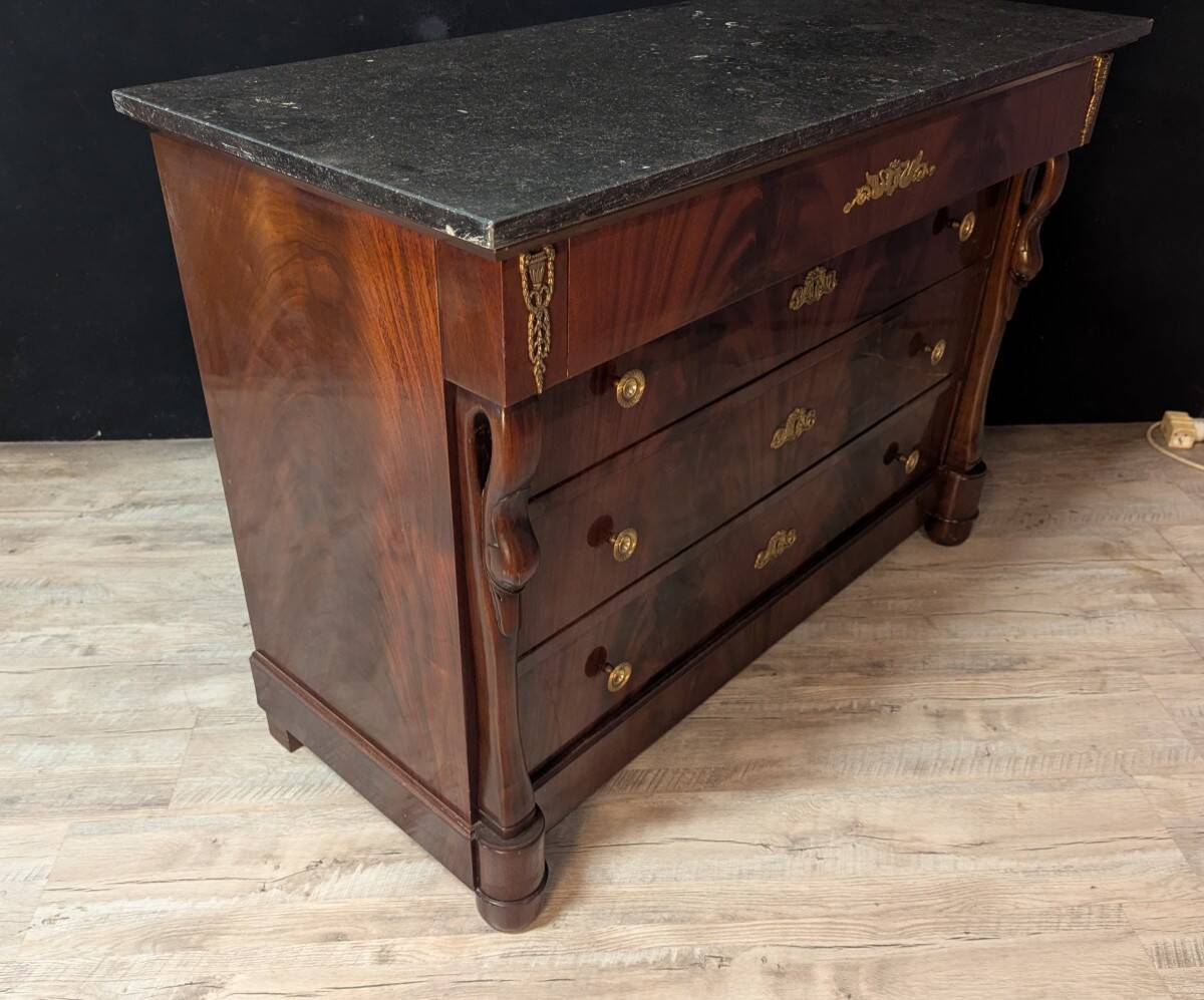 Mahogany chest of drawers with swan decoration