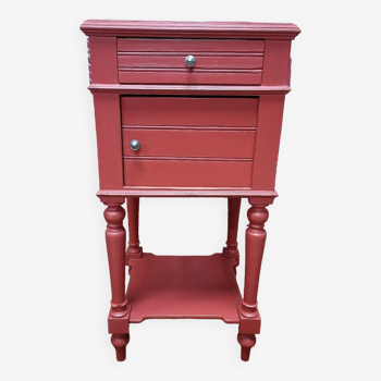 Classic bedside table with white marble, painted in light red