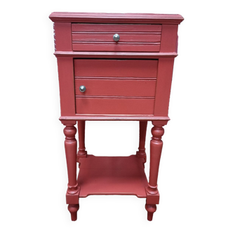 Classic bedside table with white marble, painted in light red