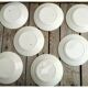 Set of 7 flat ceramic plates Badonviller Red floral decoration