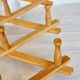 Vintage retractable wall-mounted coat rack made of pine wood