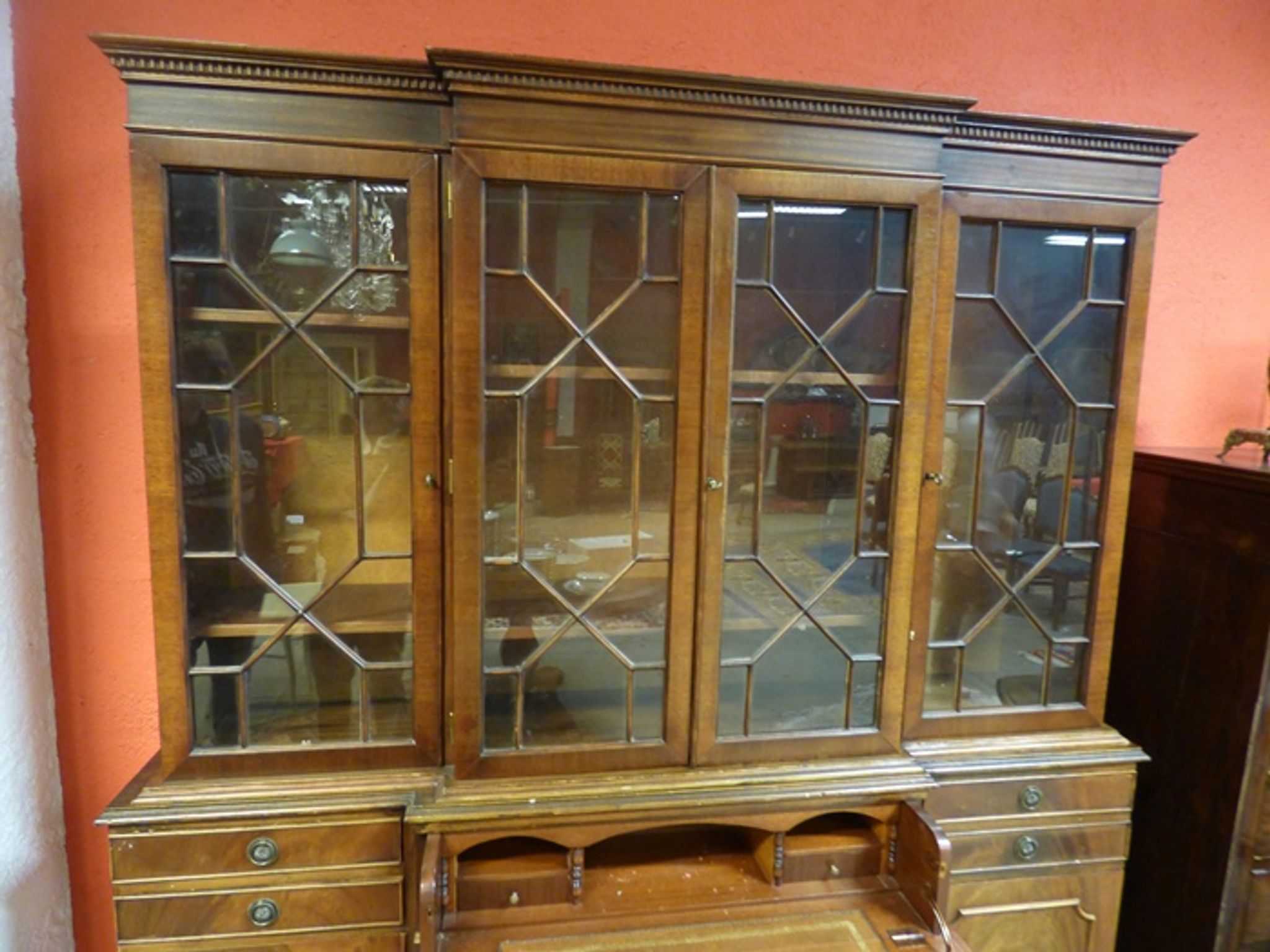 Scribanne bookcase in mahogany veneer English work of the twentieth century
