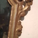 Ancienne paire de miroirs en bois sculpté et doré