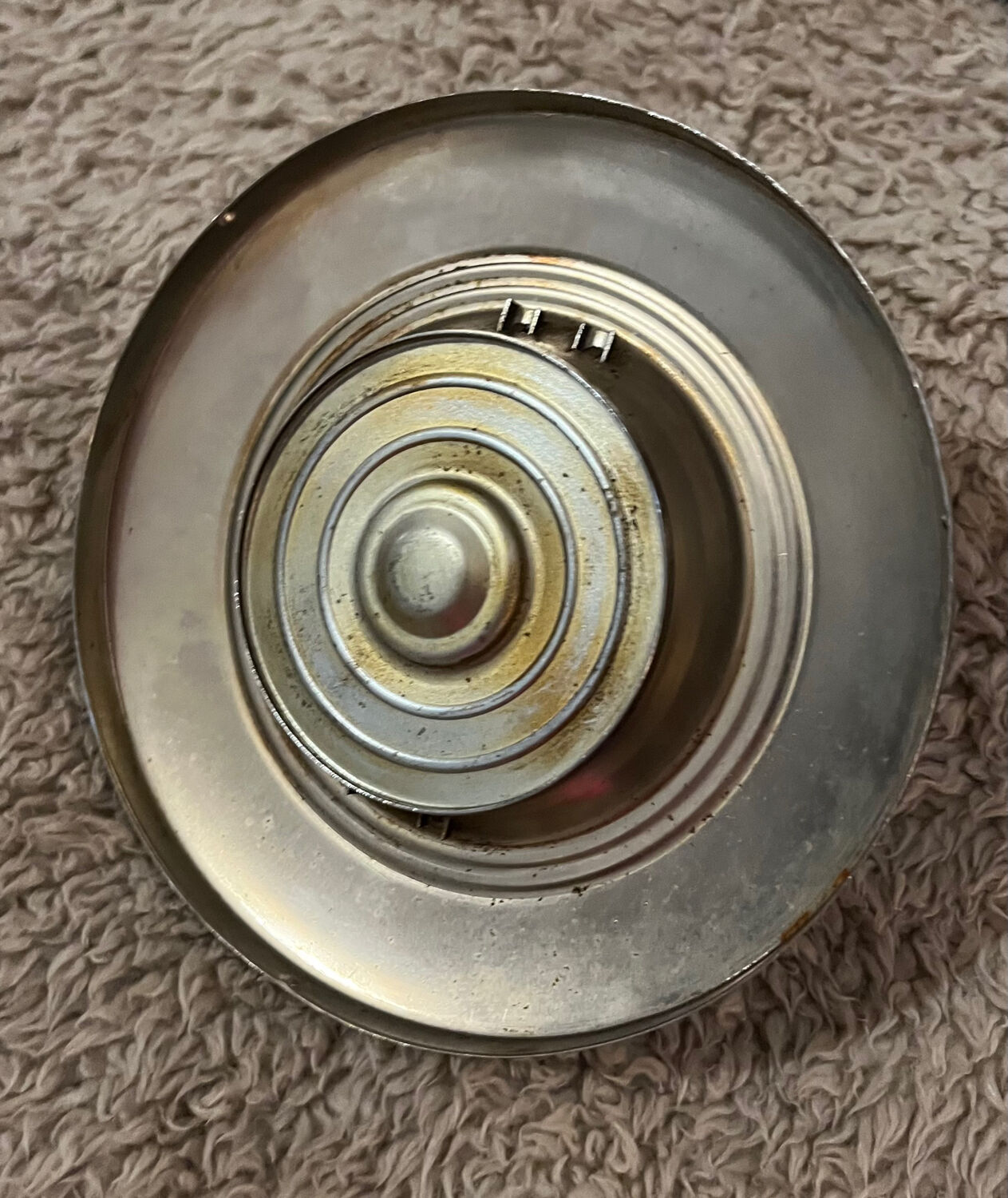 Vintage metal ashtray with magazine holder