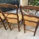 Set of 4 Provençal oak chairs with rush seats.