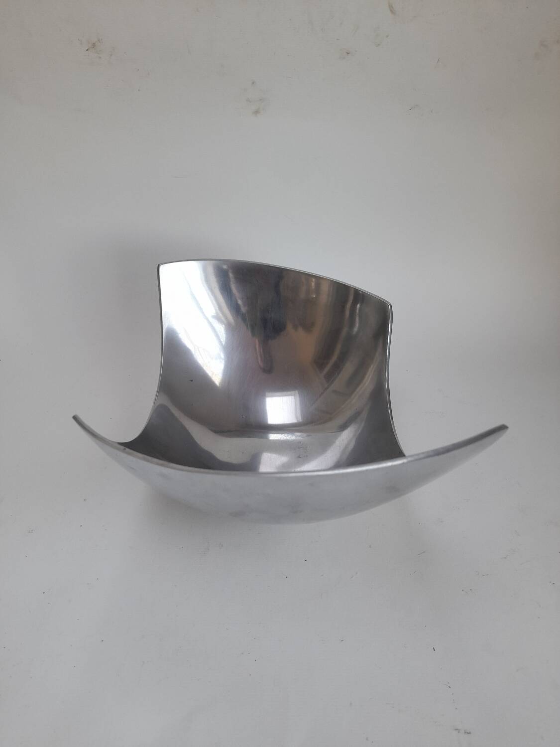 Asymmetrical aluminium fruit dish from the 90s.