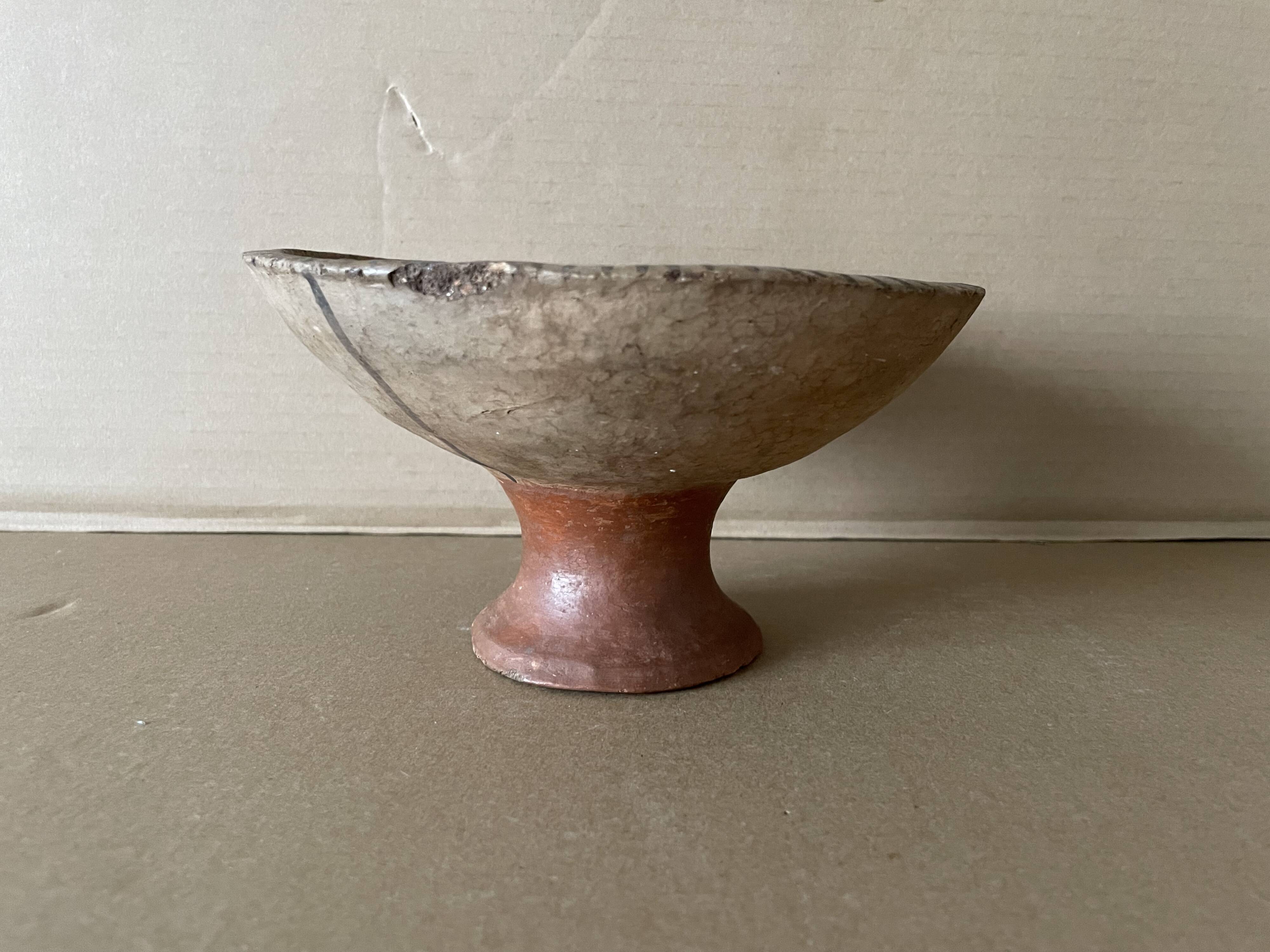 Antique terracotta cup