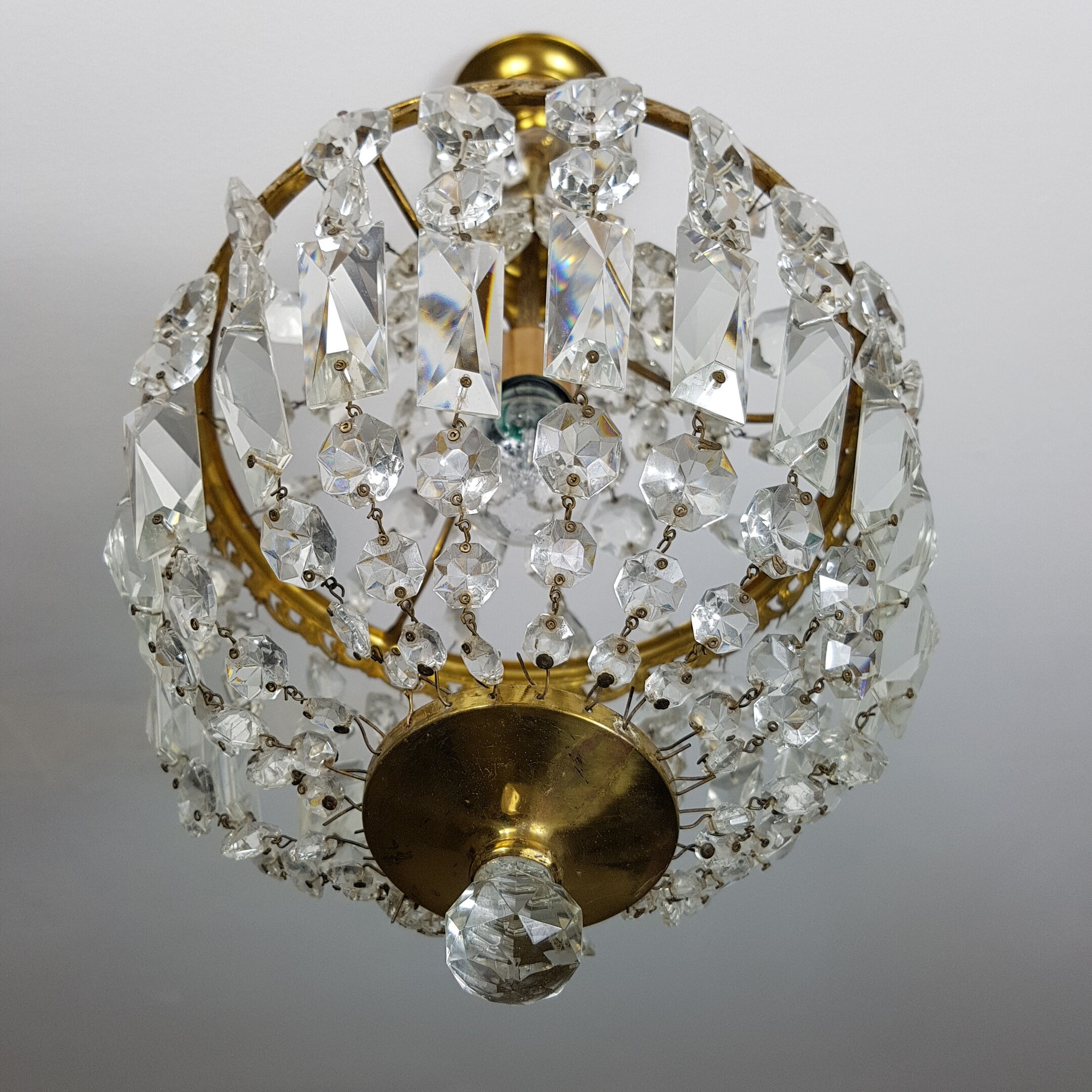 Trash in crystal chandelier