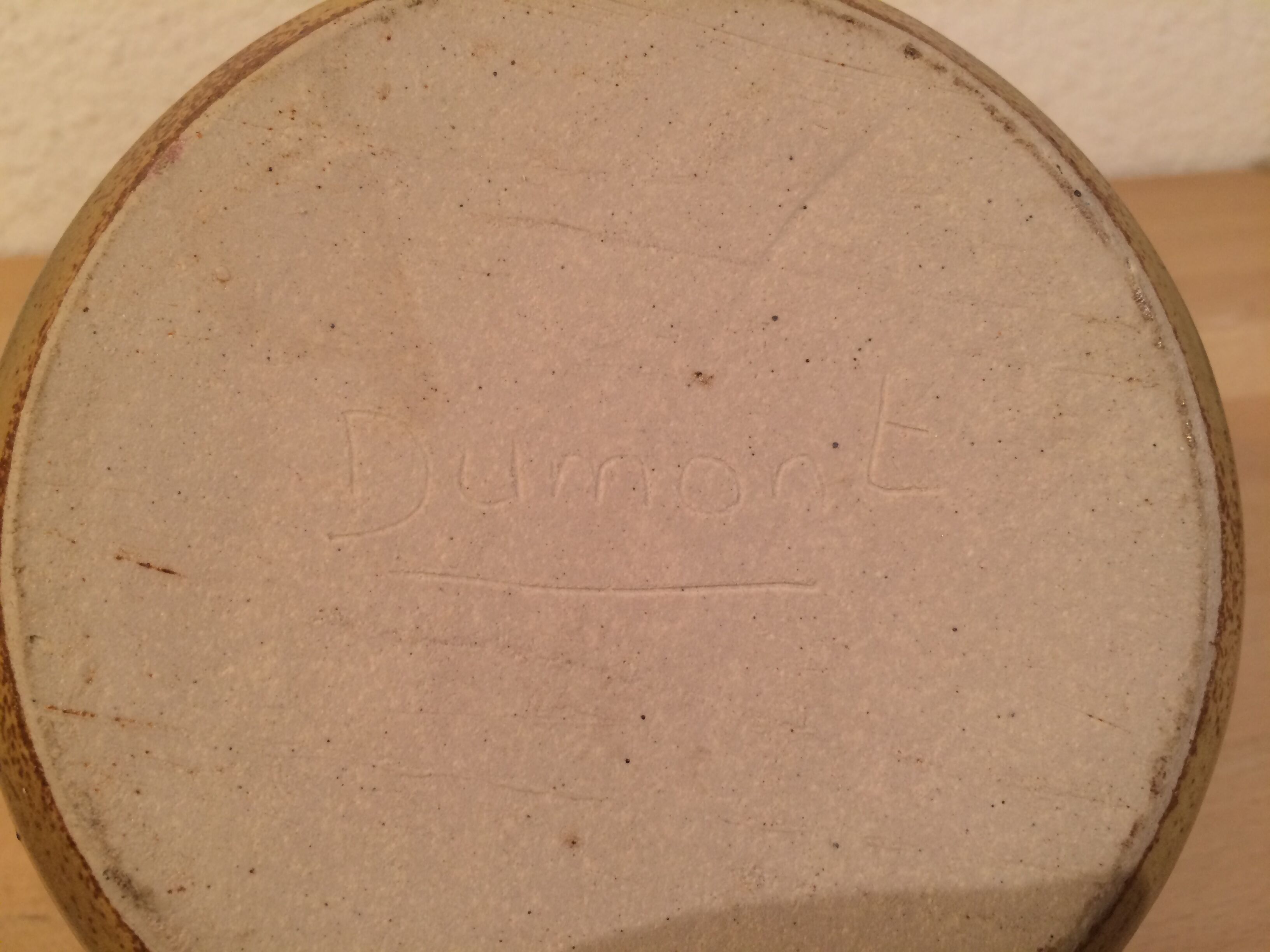 Sandstone ball vase signed Michel Dumont