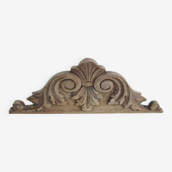 Old carved wooden pediment