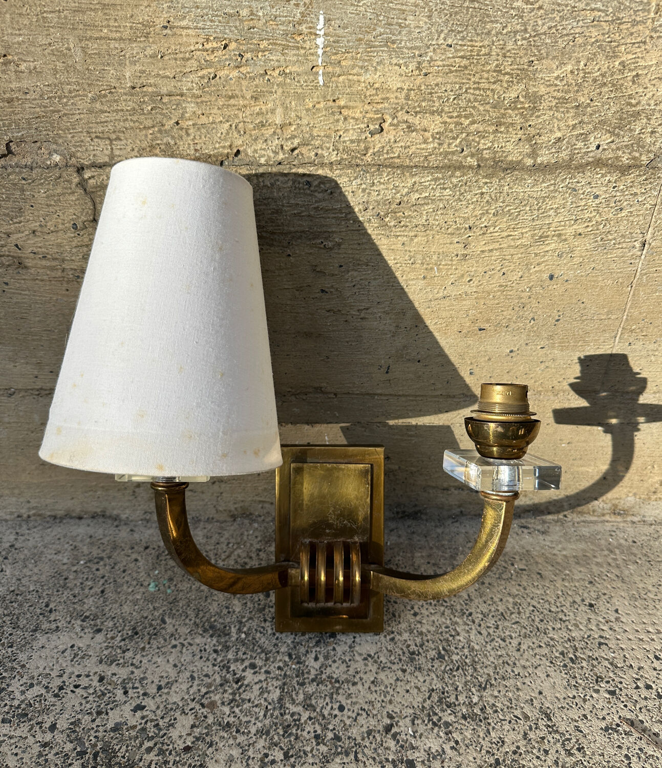 Antique Art Deco wall sconces attributed to Jacques Adnet.
