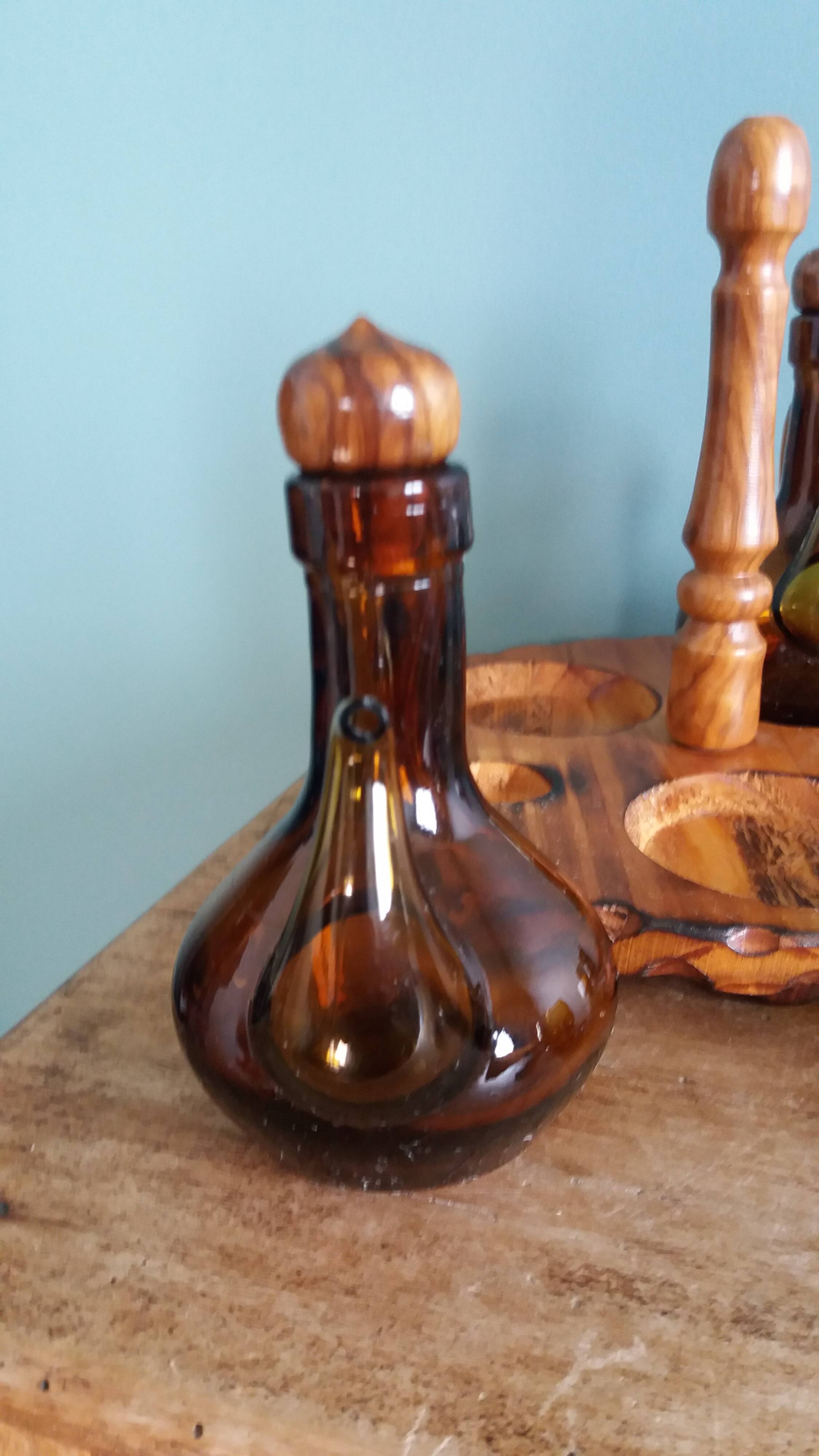 Oil, vinegar, mustard, pepper, salt, olive wood servant from Spain.