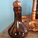 Oil, vinegar, mustard, pepper, salt, olive wood servant from Spain.