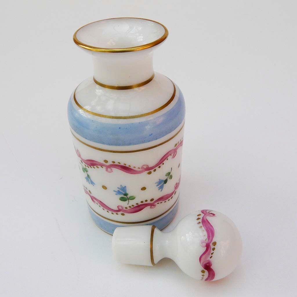 Bottle with floral decoration and antique gold edging