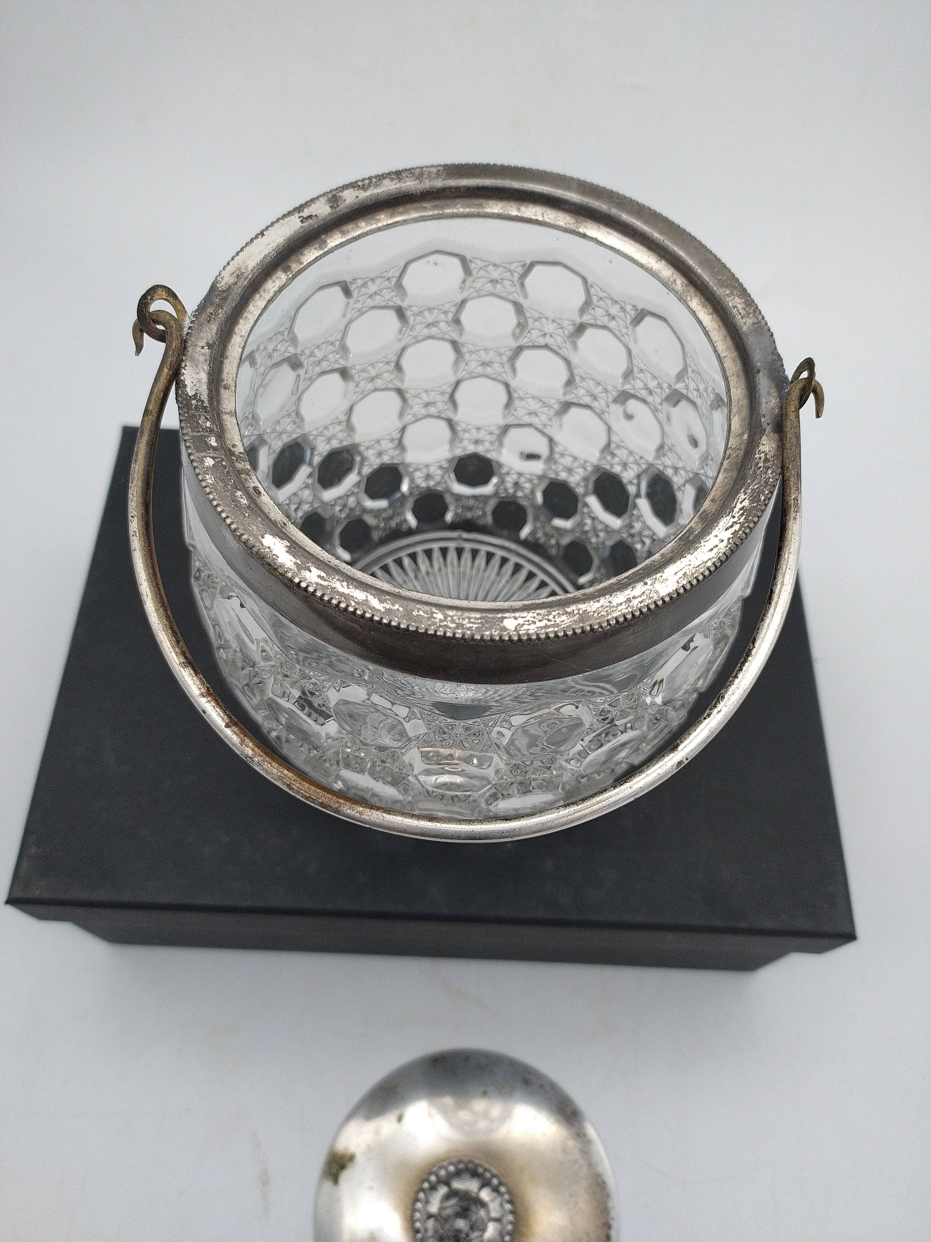 Biscuit, ice cube or candy pot, made of crystal and metal.