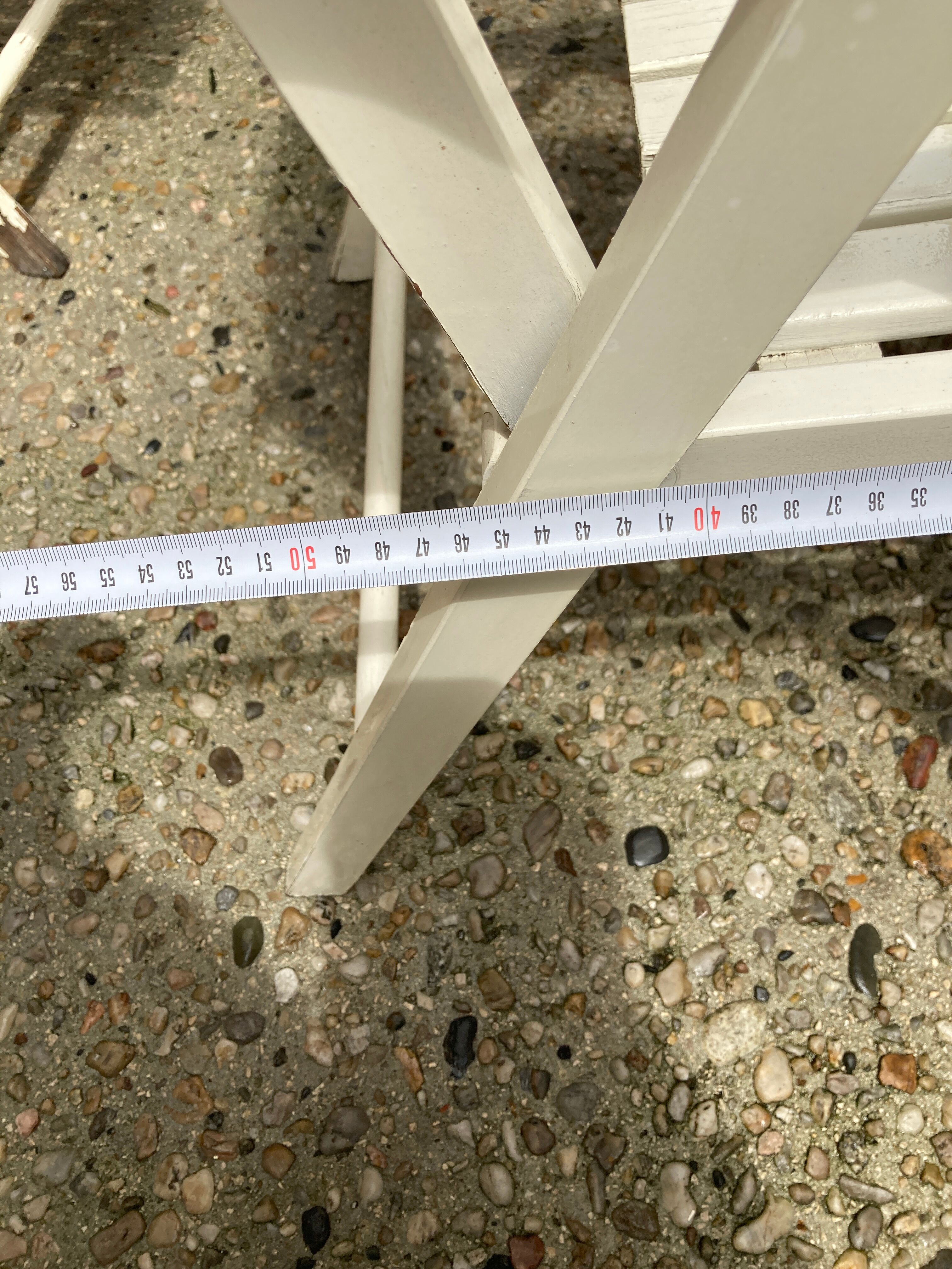 Five wooden garden armchairs