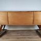 1960s sideboard with decorated doors in wood and brass