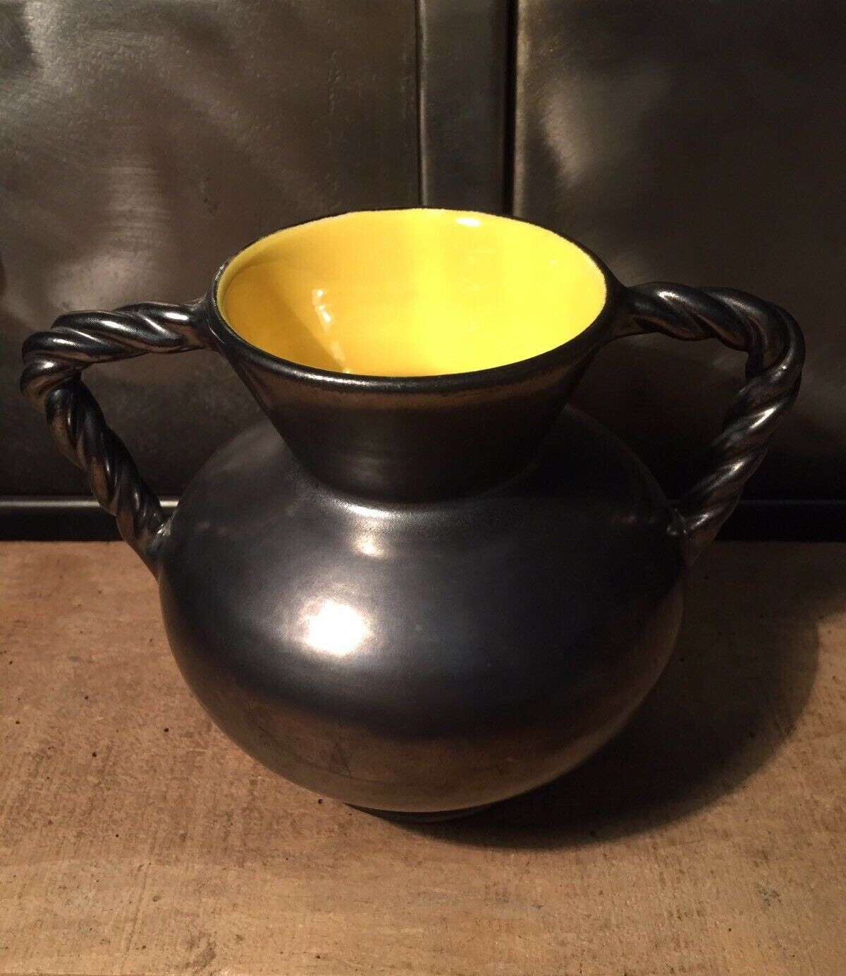 Iridescent black and yellow ceramic vase