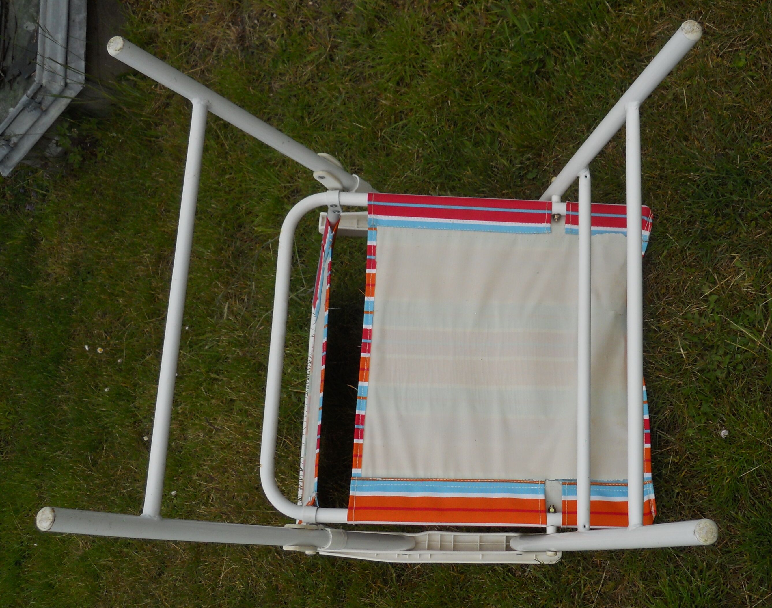 4 metal garden chairs and vintage folding fabric