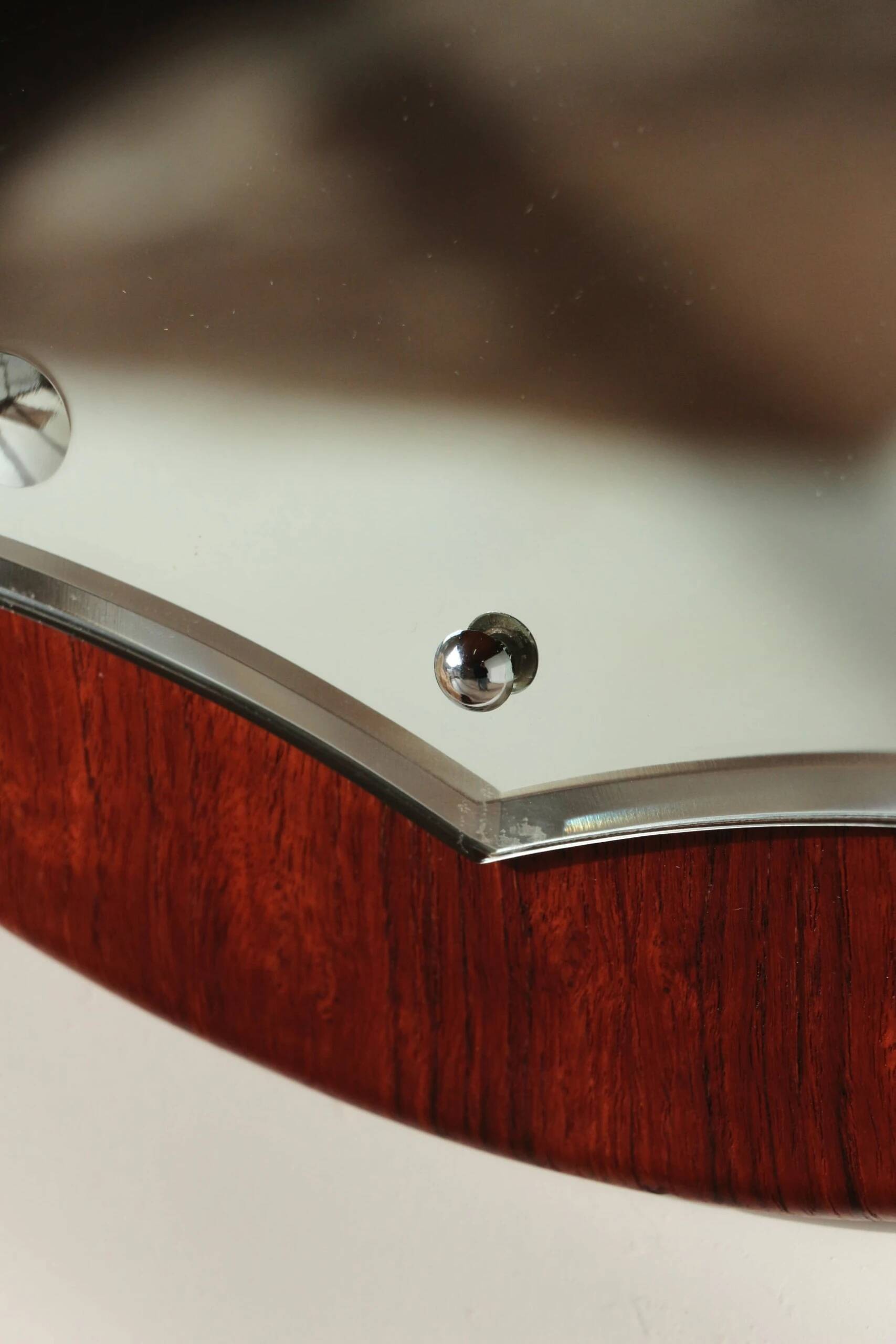 Vintage round teak mirror from the 1960s.