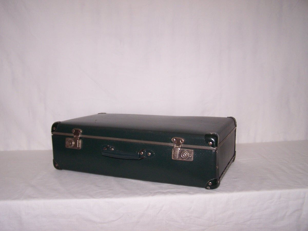 Green vintage suitcase 50s
