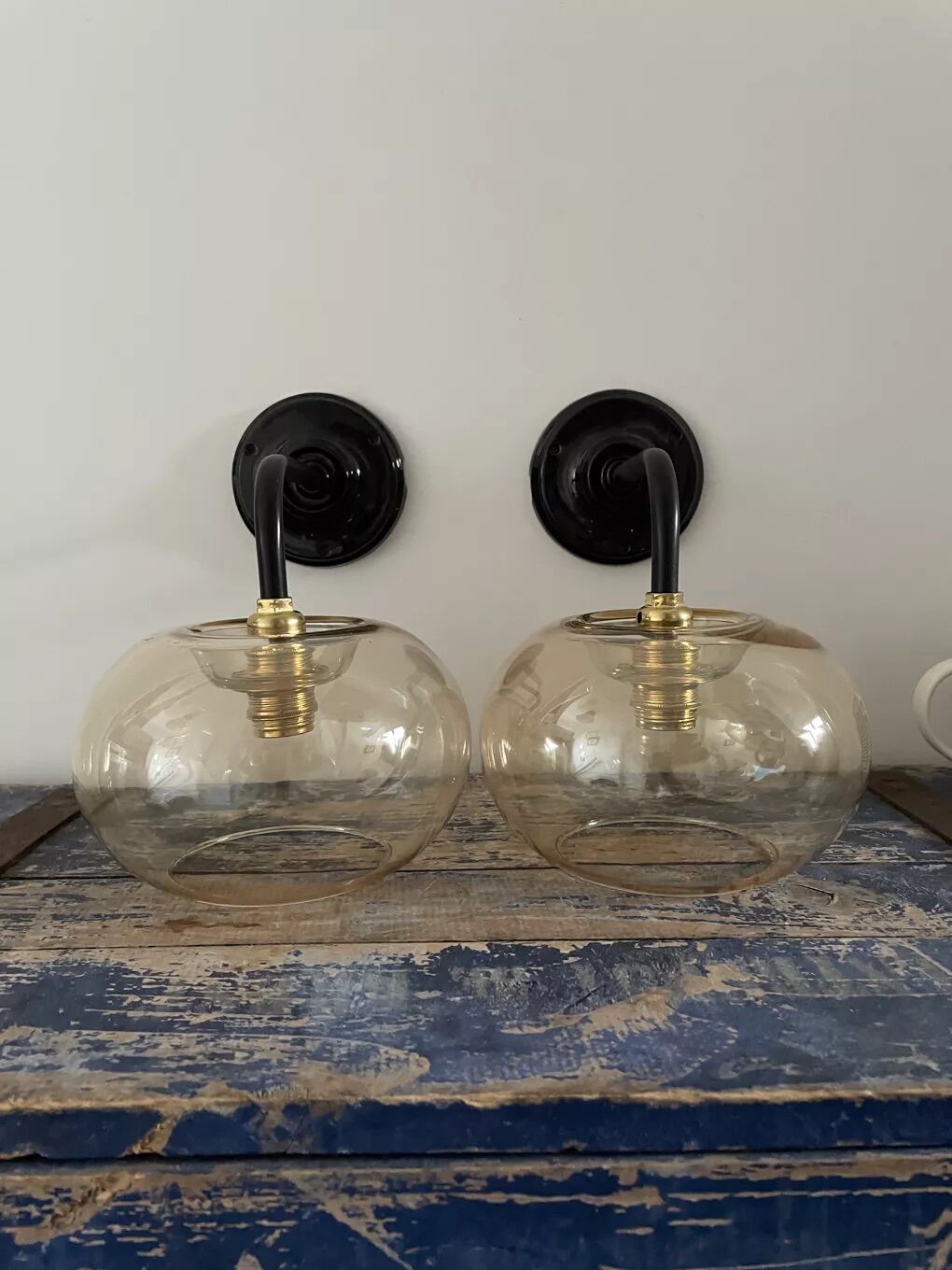 Pair of vintage electrified smoked glass wall lamps