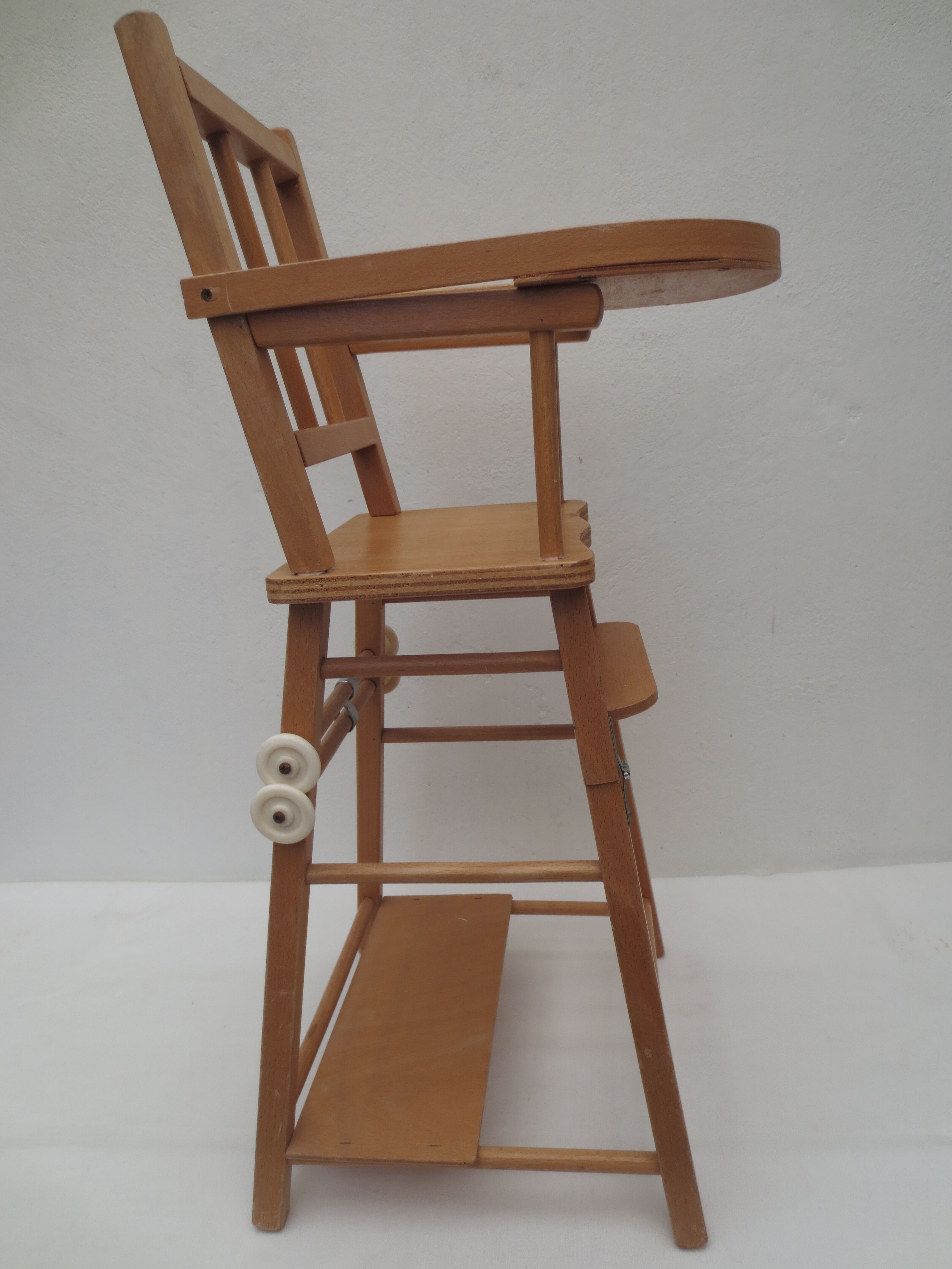 doll high chair with bars, light wood