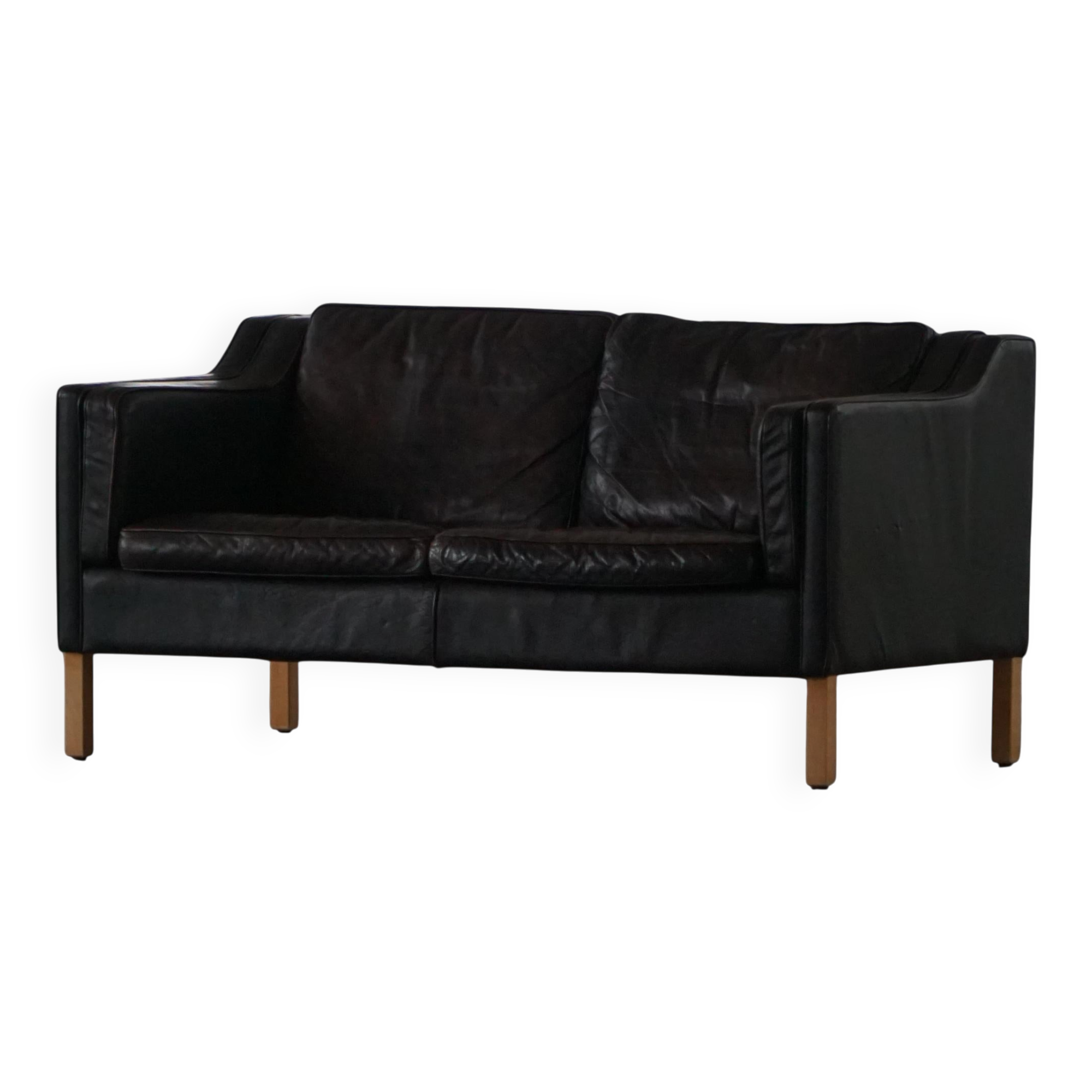 Mogens Hansen, mid-century 2-seater sofa, patinated black leather, 1970s.