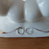 Pair of cream ceramic candlesticks with gold trim circa 1930-1950