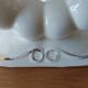 Pair of cream ceramic candlesticks with gold trim circa 1930-1950
