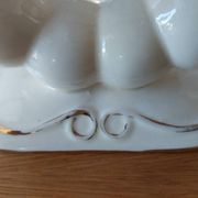 Pair of cream ceramic candlesticks with gold trim circa 1930-1950