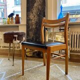 Lot de 4 chaises scandinaves en teck et skaï noir des années 60
