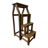 Stool transforming into a step ladder.