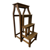 Stool transforming into a step ladder.