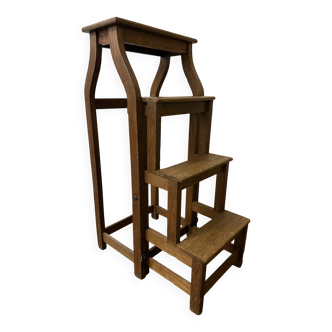 Stool transforming into a step ladder.