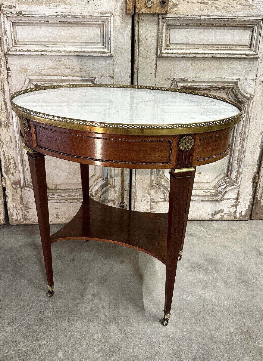 Small salon table in Directoire style, 20th century.