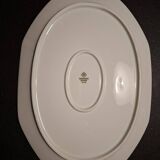 Dishes and porcelain sauceboat