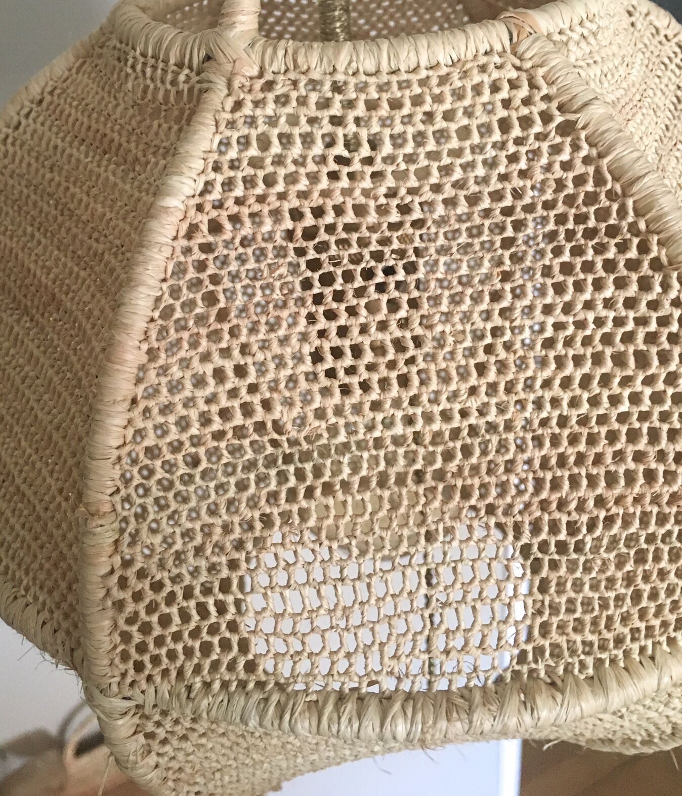 Hanging lamp in raffia