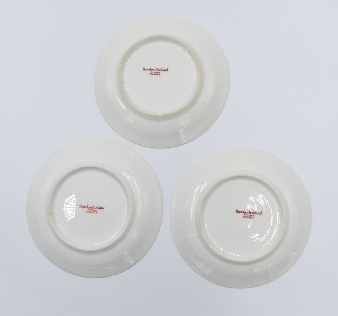 Three cups and under porcelain tea cups from Limoges Haviland barbed-wire décor