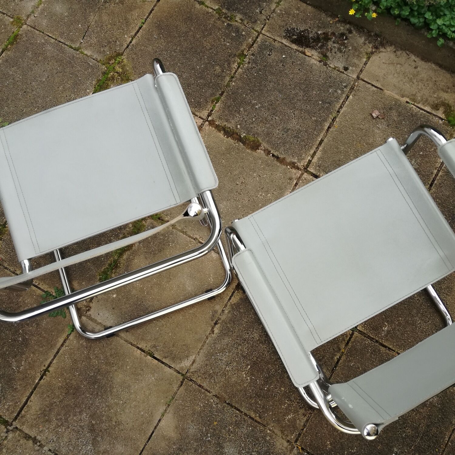 Pair of cantilever armchairs in grey leather made in italy